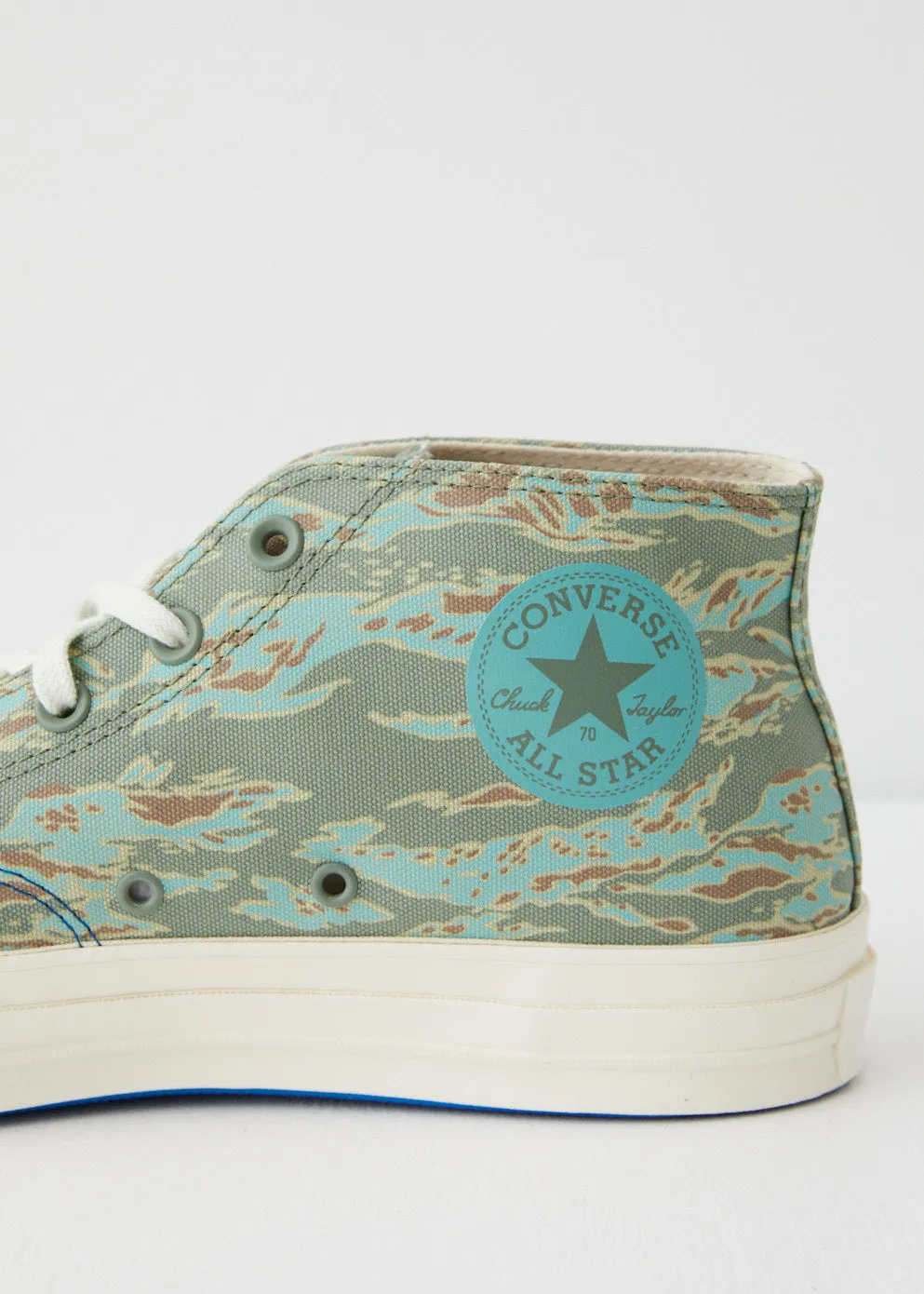 x UNDEFEATED Chuck Taylor 70 Mid Sneakers
