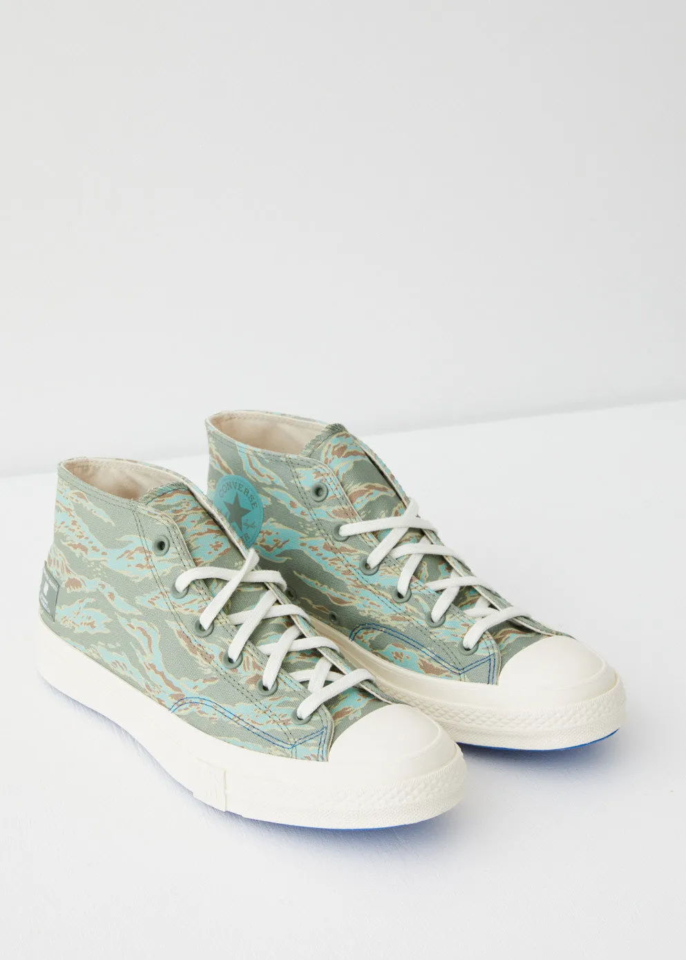 x UNDEFEATED Chuck Taylor 70 Mid Sneakers